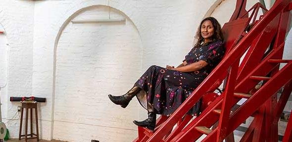 Professor Hiranya Peiris with the Northumberland Telescope at the Institute of Astronomy.