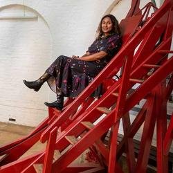 Professor Hiranya Peiris with the Northumberland Telescope at the Institute of Astronomy.